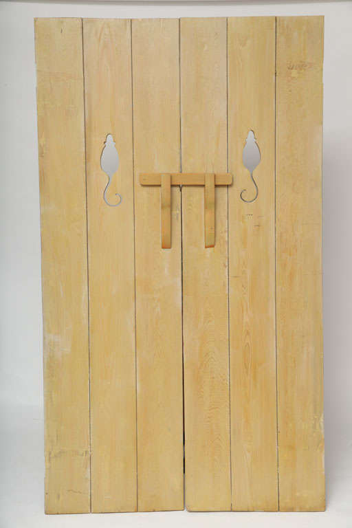 Porte originali della cabina dell'hotel Boca Raton
progettato da Addison Mizner. Ritaglia la sagoma di un topo sulle porte.
Ogni porta misura 22 1/2