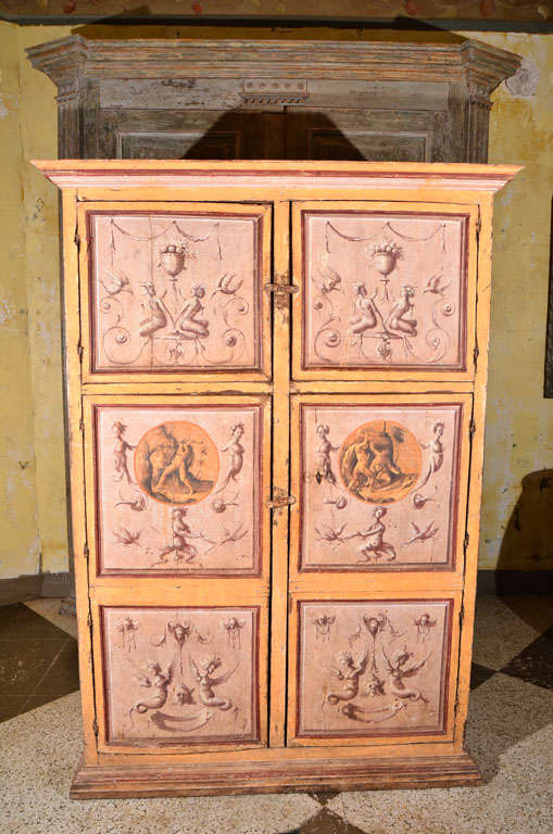 Painted 18th century Tuscan armoire with mythological figures.

Middle panels show 