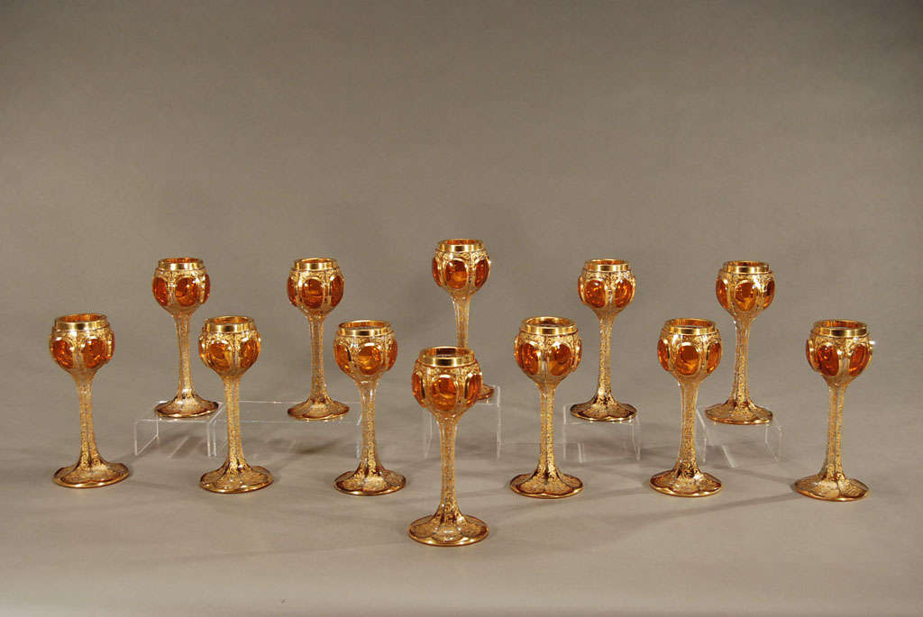 This set of 12 hand blown and panel cut crystal goblets are 