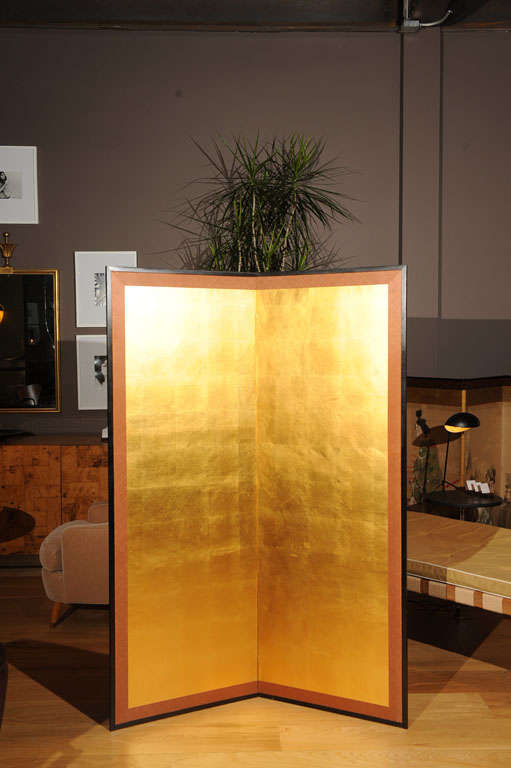 A 2 panel folding Japanese screen using gold leaf.