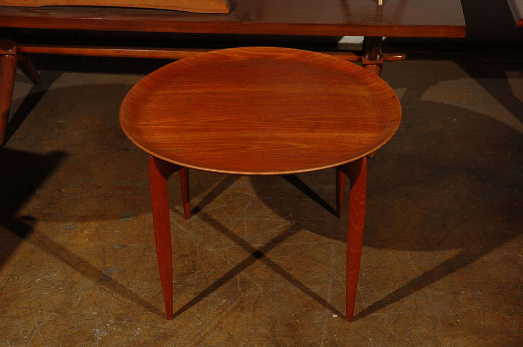 Nice and collapsible side/ tray table with the retailer's label.