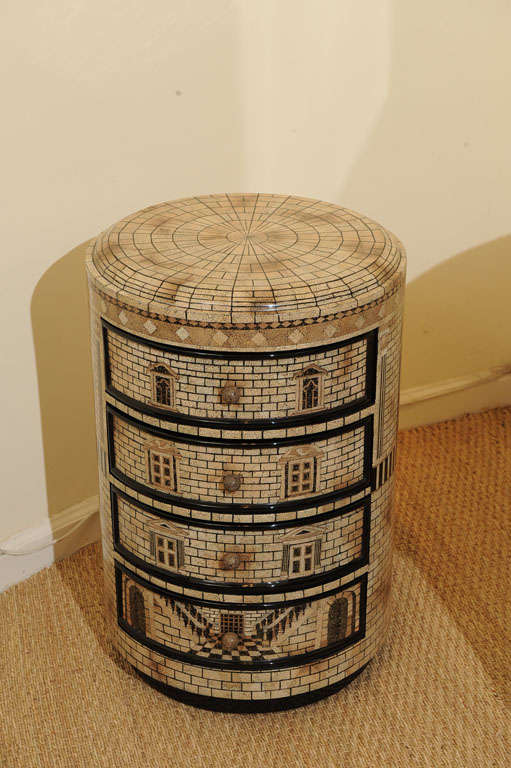Wood A Fornasetti style chest of drawers For Sale