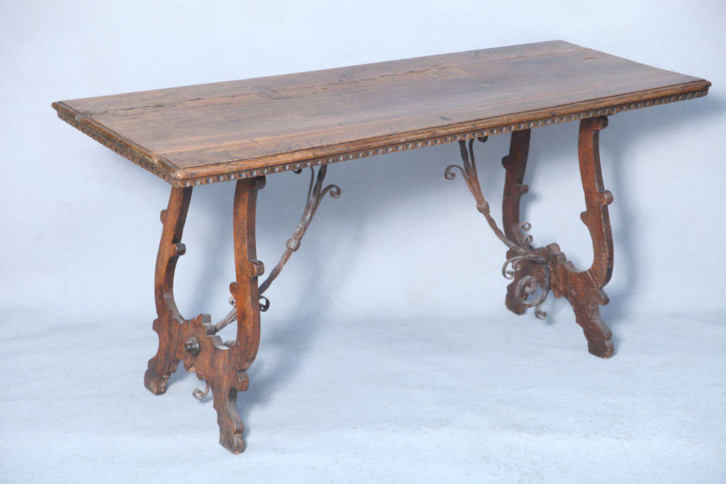 Anitque Walnut Trestle Table with Elaborate Iron Stretcher