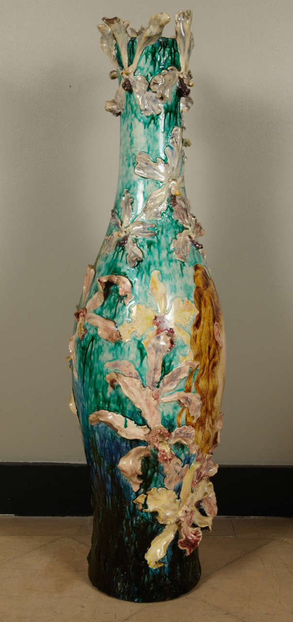 Impressive vase, colored barbotine with a portrait of a young red hair girl with many orchidees in relief.
Beautiful hand painting.
Signed by Clair Guyot, famous artist at Gien
dedicated to 