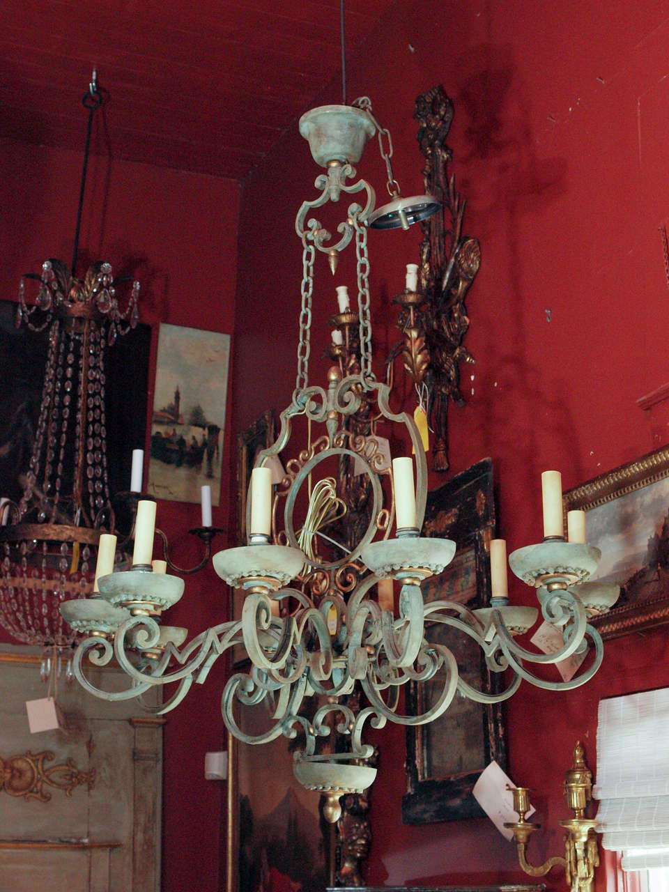 1920-30 rectangular iron chandelier painted in green with glass inserts under the bobeches. U S wired.