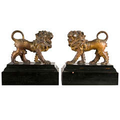 A Pair of late 18th Century Continental Gilded Wood Lions