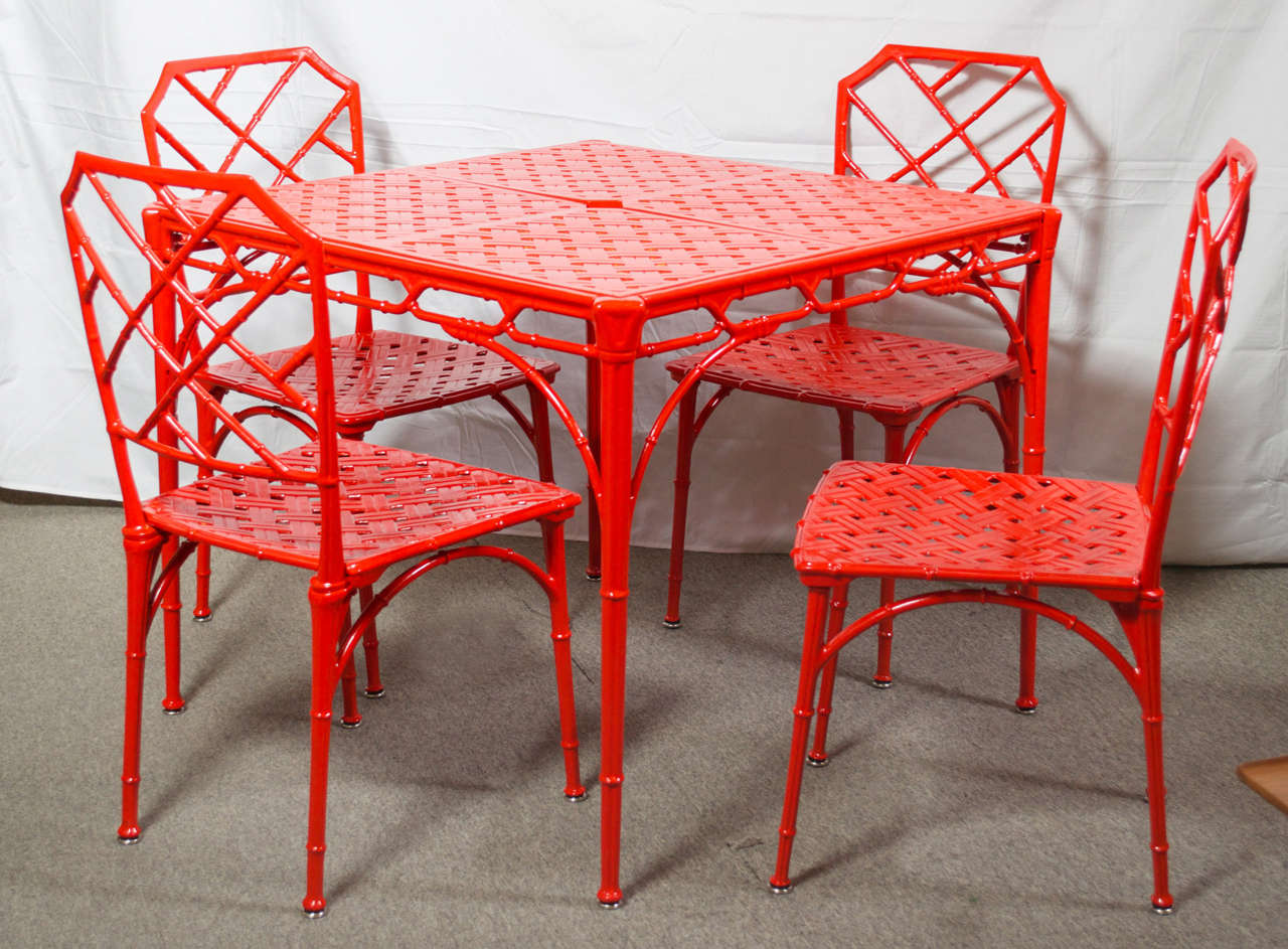 Give your home a splash of color this summer with this aluminum faux bamboo patio set, recently powder coated in Vermilion. Set would work nicely indoors or outside on the patio.
Chairs are 17.38w x 20d x 34h with seat height 16.50