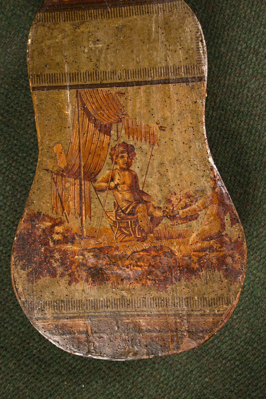 A fine and unusual lacca povera Northern Italian neoclassic guitar case late 18th century. The decoupage applied to a wood case. Provenance Dorothy Chandler Estate, circa 1770.