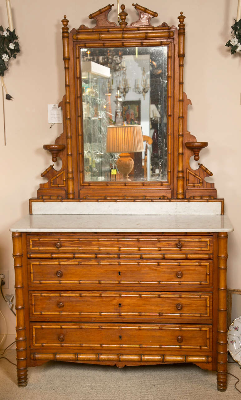 19th c. Faux Bamboo French Chest of Drawers  with marble top & removable mirror.