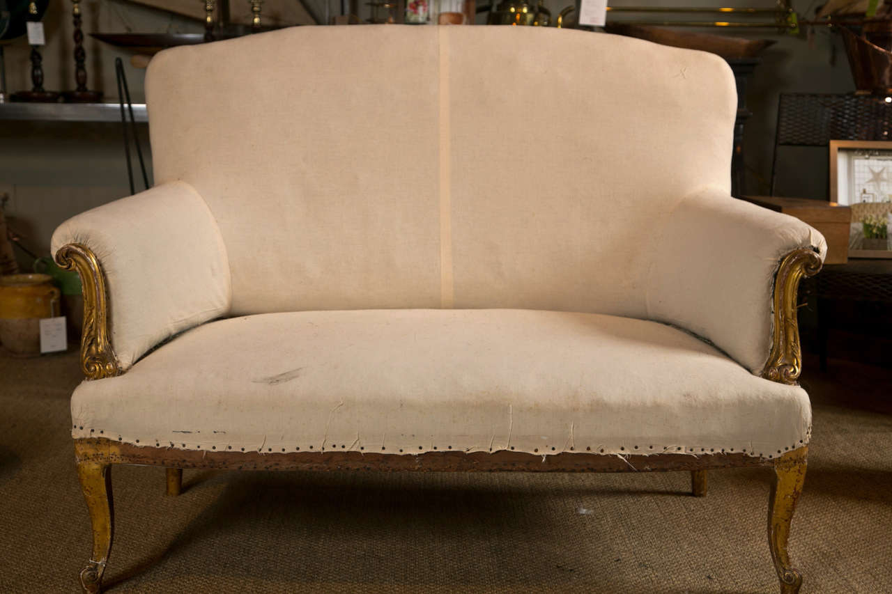 French Carved Giltwood Sofa with Scroll Arms and Cabriole Legs at
