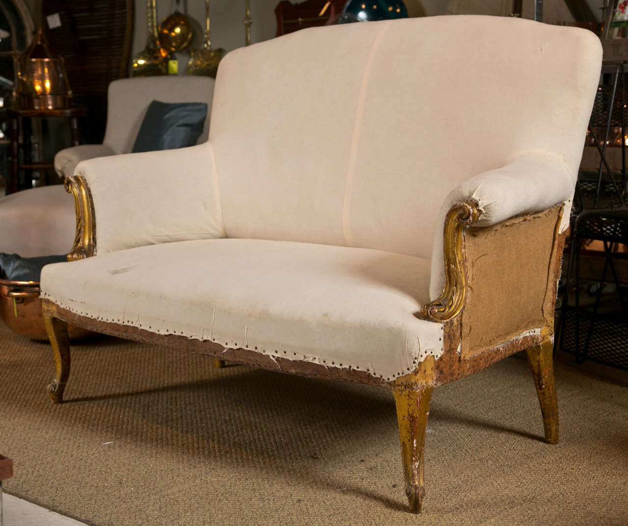 French Carved Giltwood Sofa with Scroll Arms and Cabriole Legs at