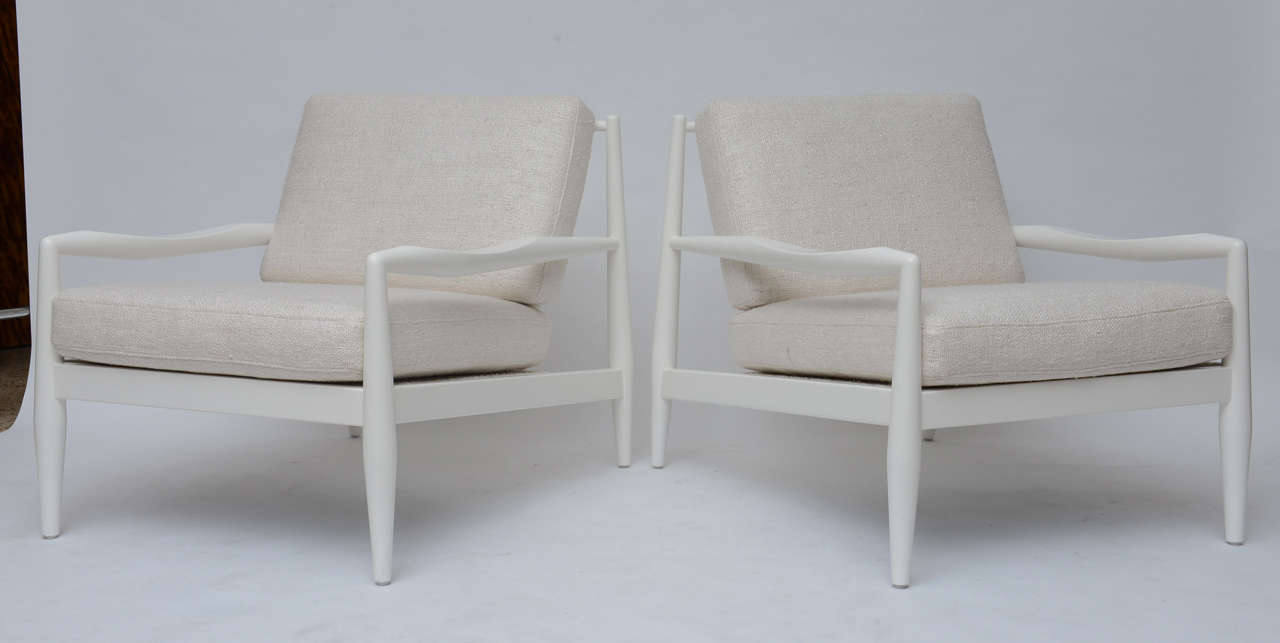 The long, low, lines of these chairs make them one of our favorite designs by Adrian Pearsall. We've lacquered their walnut frames off-white and added new cushions in a very thick, richly textured, heavy-weight silk in cream.
