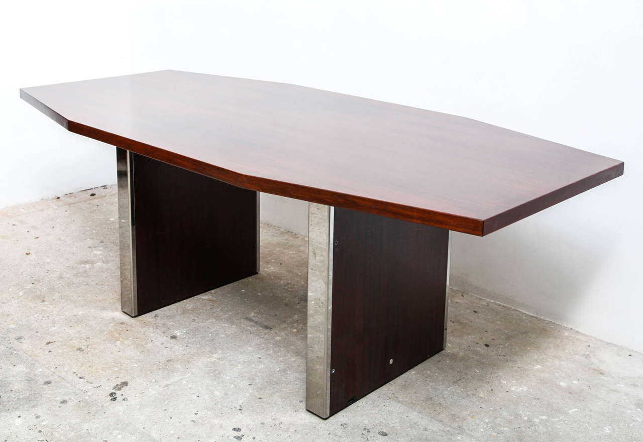 Writing table or desk with mirror-polished stainless steel detailing.