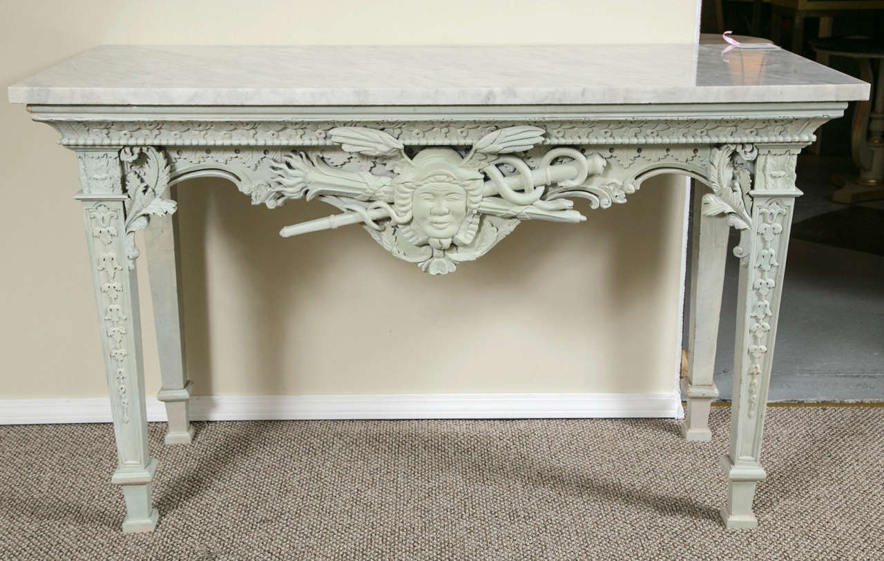 Pair of monumental French painted marble-top console tables. This is simply the finest pair of antique (19th early 20th century) Swedish painted style console tables one could hope to find. The off-white / gray / blue color is distressed throughout.