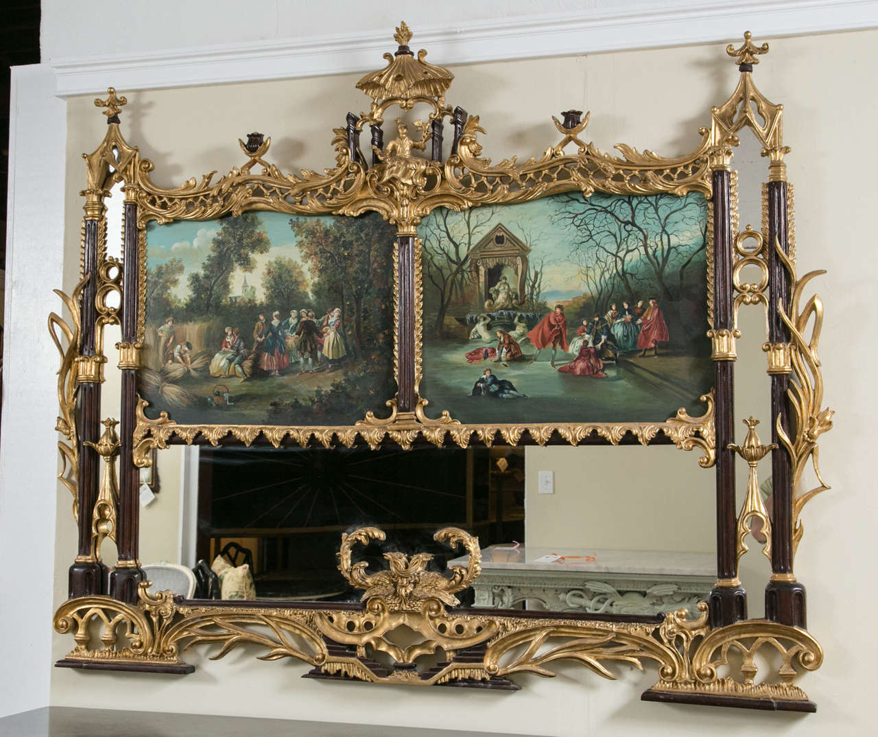 Pair of palatial Chinese Chippendale style mirrors. A spectacular example of the use of Chinoiserie in 18th century Chippendale design. With ebonized and antique gold leaf that adds beauty in every aspect. These monumental mirrors would make a one