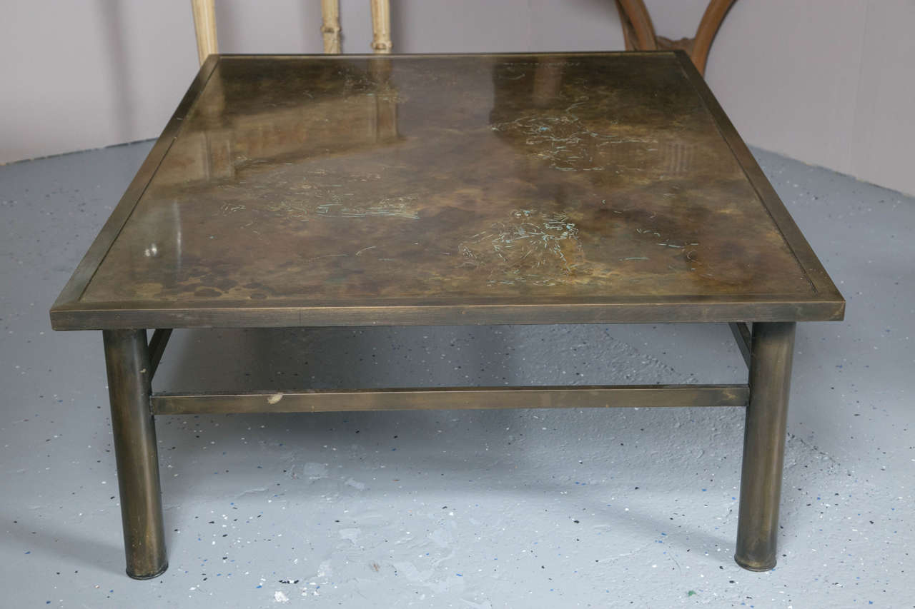Philip & Kelvin LaVerne acid etched bronze zodiac coffee table. This rectangular shaped coffee low table having four legs and a support connection. The top appears to be in fine condition. This piece purchased directly from a Park Avenue home.
