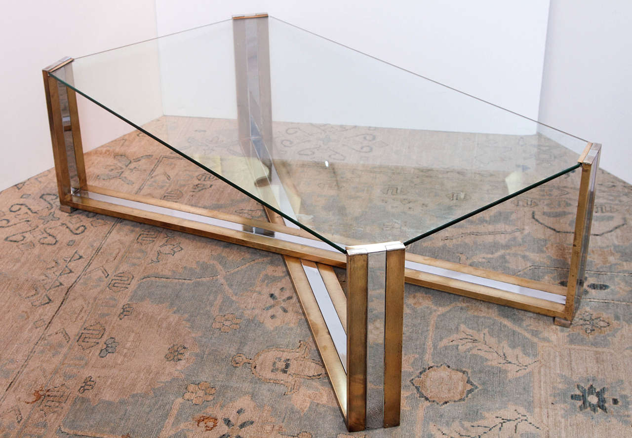 Pair of Italian brass and chrome coffee tables by Romeo Rega, circa 1970s.

The pair of coffee tables can be split by request.