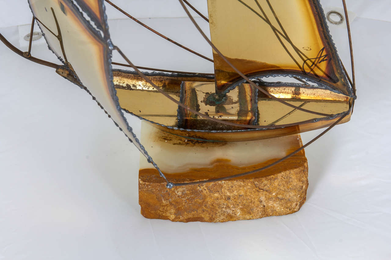 Mid-Century Modern Charming Torch Cut Brass Sailboat Sculpture For Sale
