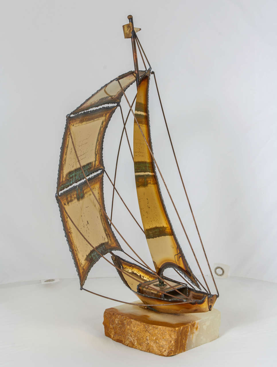 American Charming Torch Cut Brass Sailboat Sculpture For Sale