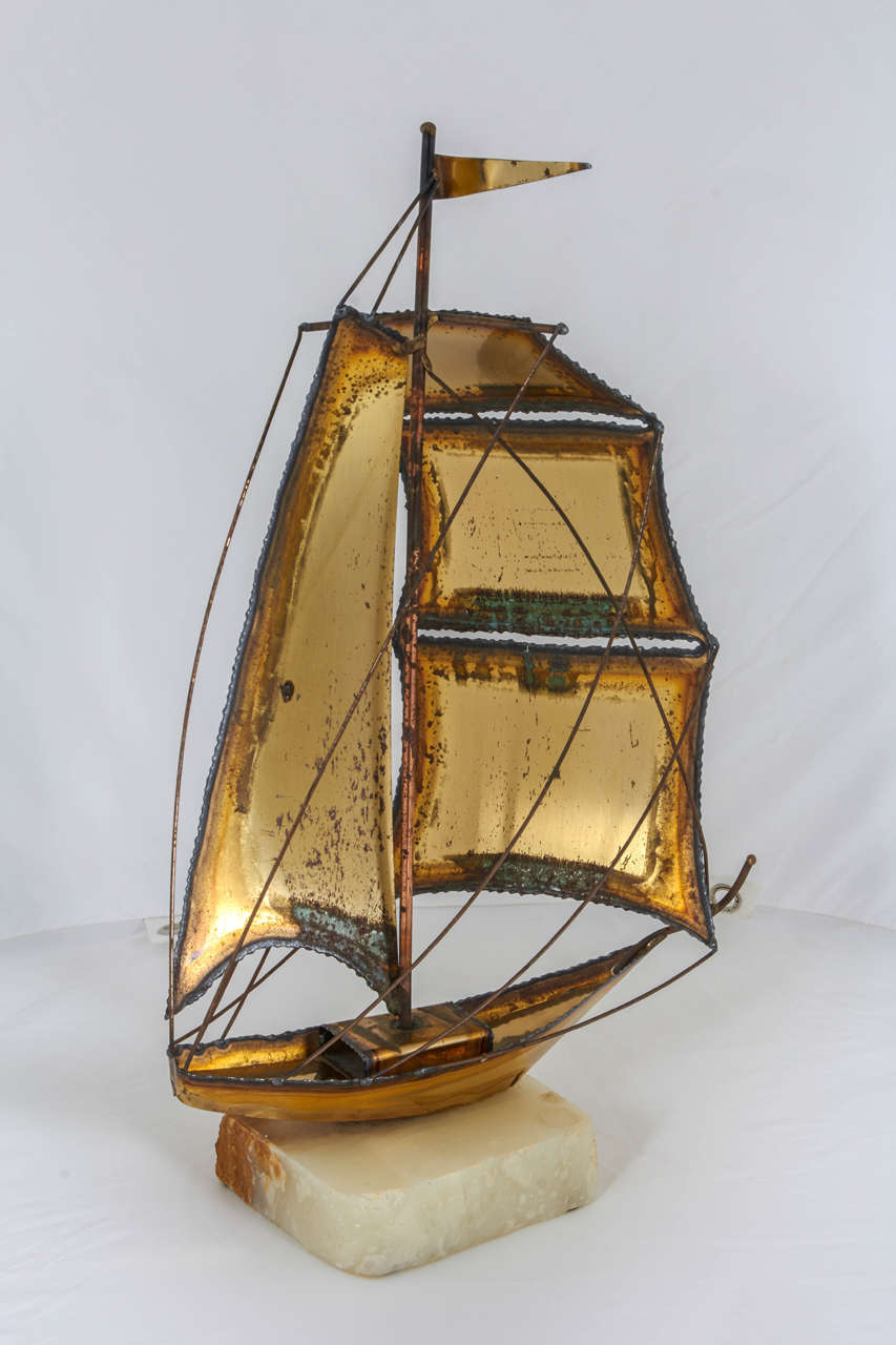 Charming Torch Cut Brass Sailboat Sculpture For Sale 2