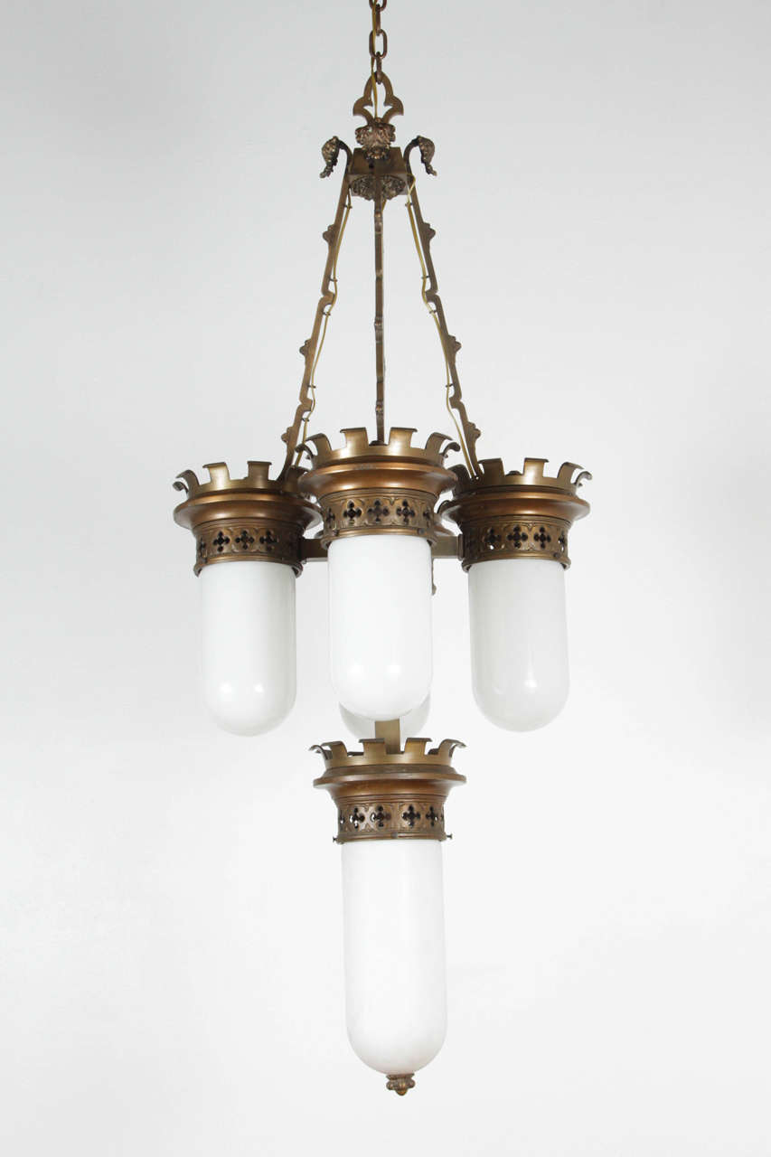 Incredible neo-Gothic fixture is newly rewired for five standard bulbs. Matching single pendant available. Chain is 7 feet long, can be adjusted.