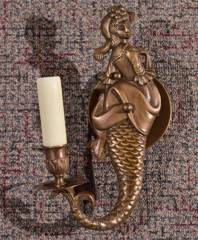 Beautifully detailed antique brass mermaid wall sconces, newly wired.