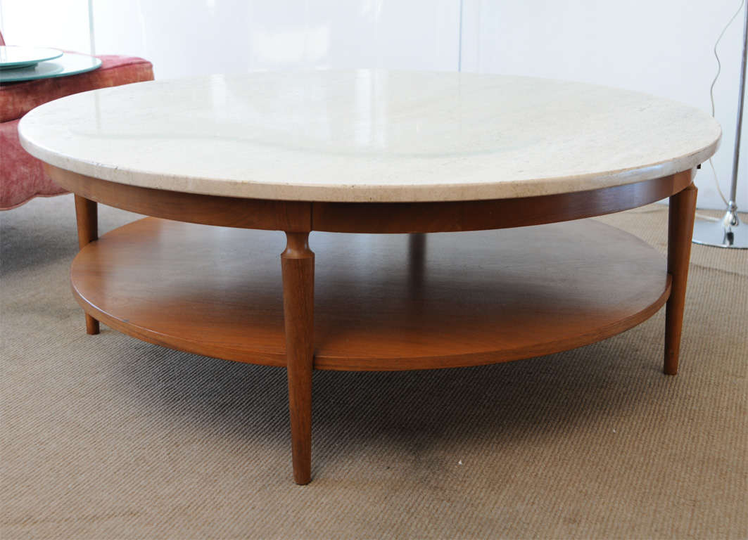 Beautiful, elegant clean-lined table. Teak wood Base with an Italian Travertine Marble Top. Very heavy Marble.