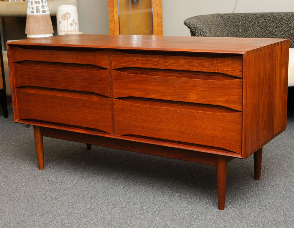 ...SOLD DECEMBER 2012...Fine six drawer chest of drawers by Johannes Aasbjerg Andersen in solid teak.  Highlighted by Arne Vodder style bowtie drawer fronts.  Masterfully executed, finished all around...beautiful condition.  Wonderful solid teak