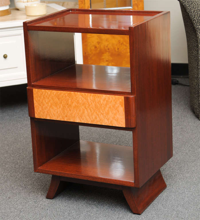 SOLD JULY 2012 Absolutely beautiful design by Eliel Saarinen, this mahogany & birdseye maple bedside table or nightstand has a sleek streamline moderne form from the forties with round edge drawers and a stylized splayed foot.  Versatile in style,