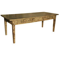 A 19th century French grey painted kitchen table with a patinated zinc top