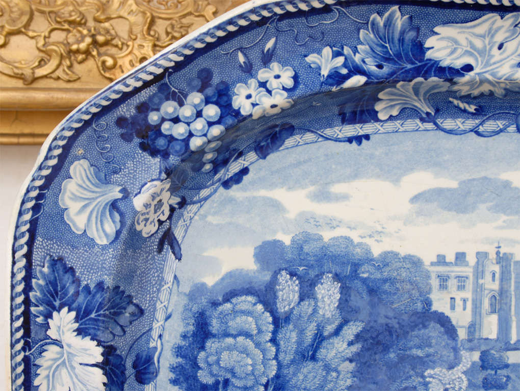 This blue and white platter is by Enoch Wood & Sons and shows a view of Brancepeth Castle west of Durham, once the home of the Nevilles. It has a blue printed pattern mark and an unreadable impressed mark on back.