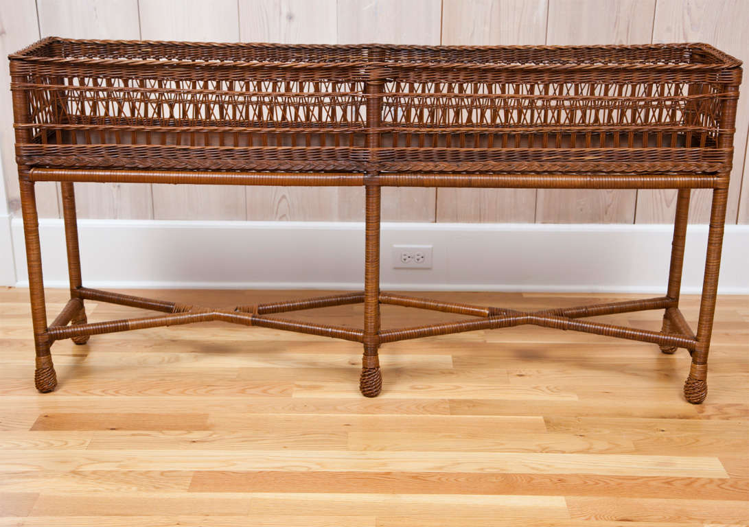 Extra long five foot wicker planter in natural finish.