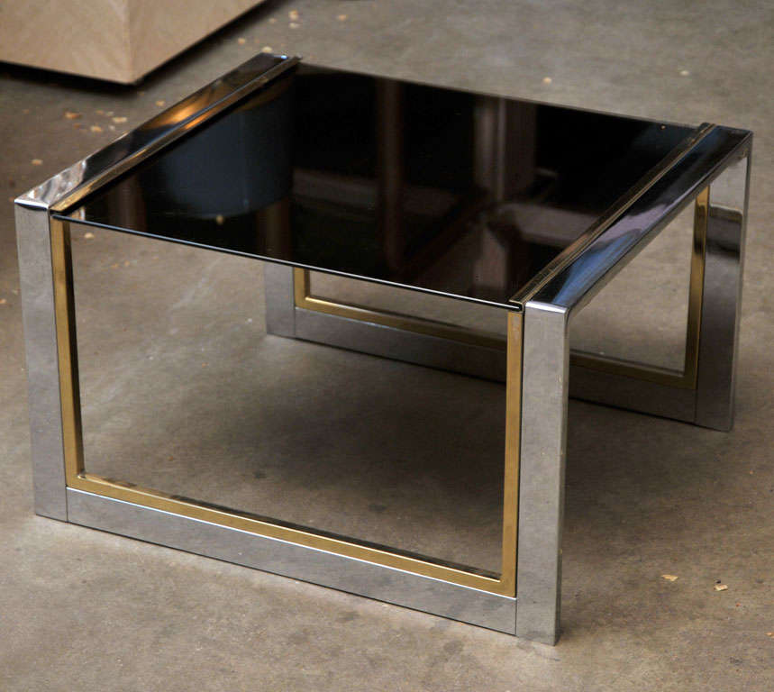 Very elegant small chrome, brass and glass side table with smoked glass top.
