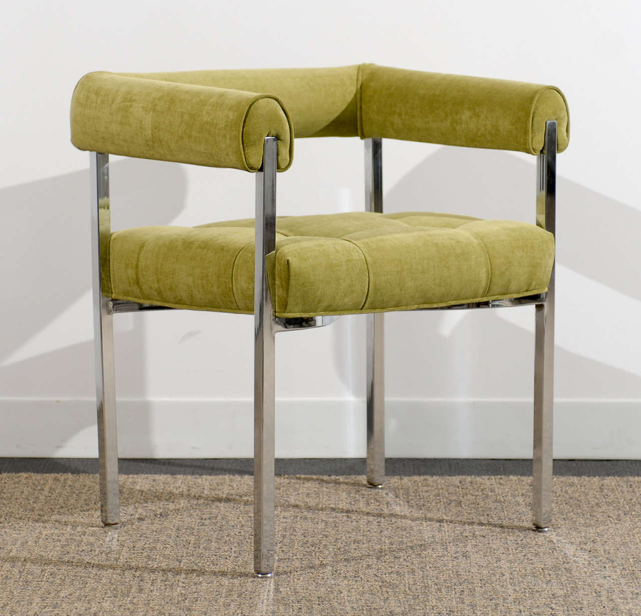 A great, comfortable pair of chrome armchairs in the style of Milo Baughman. Produced by Howell, Circa 1970. Upholstered in lime chenille fabric. Excellent Restored Condition. The chrome is in Excellent Condition as well. The price noted is for the