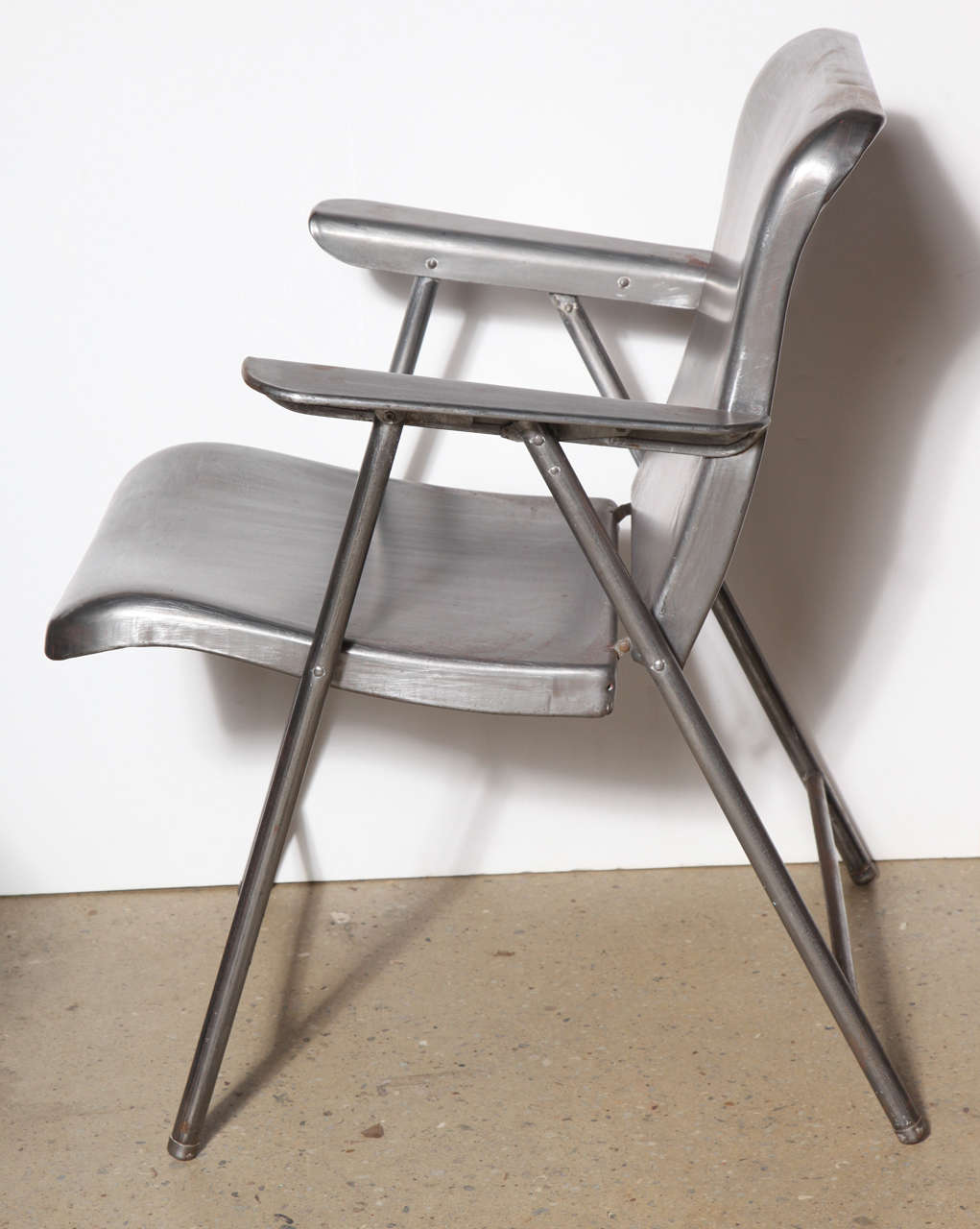 American Set of Four Russel Wright Folding Steel Arm Chairs, Late 1940's 