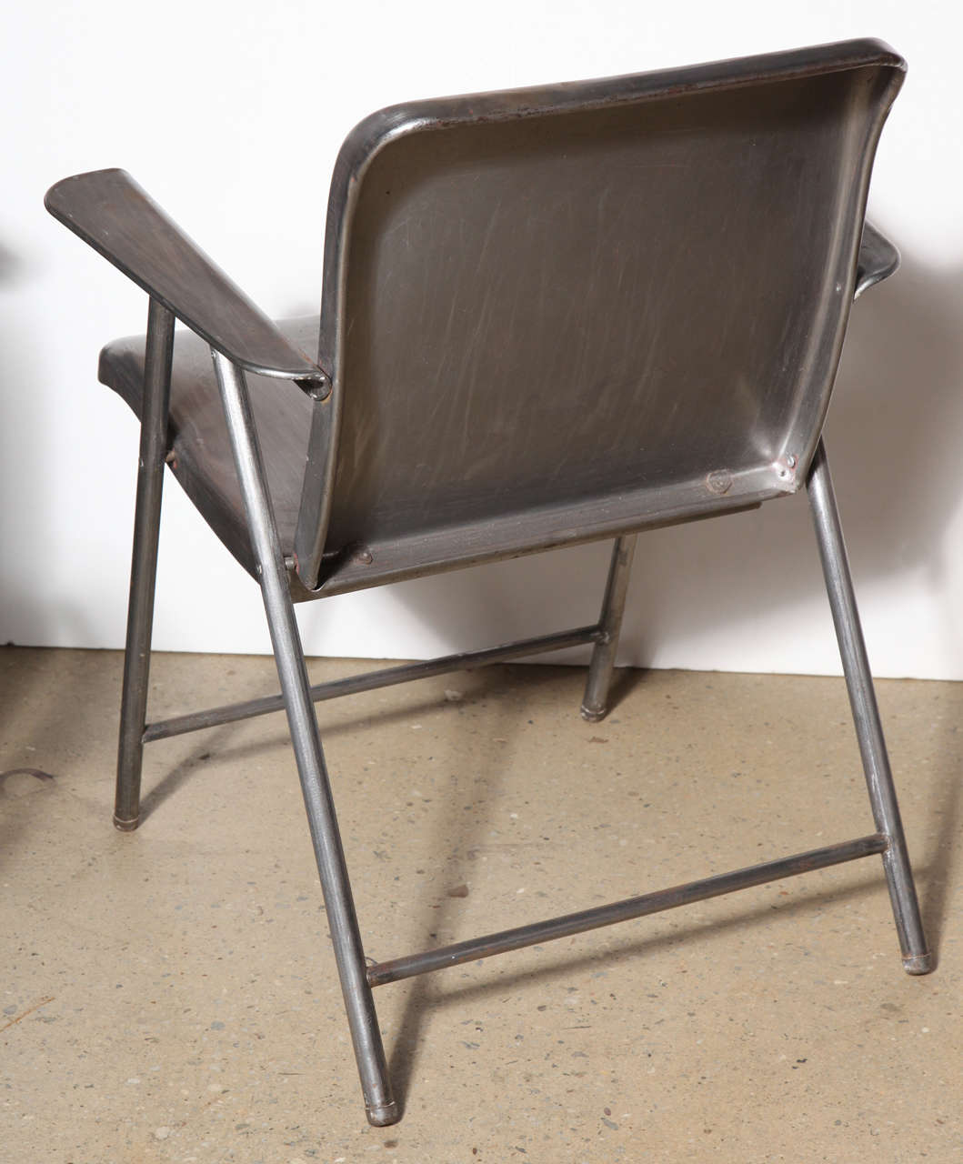 Mid-20th Century Set of Four Russel Wright Folding Steel Arm Chairs, Late 1940's 