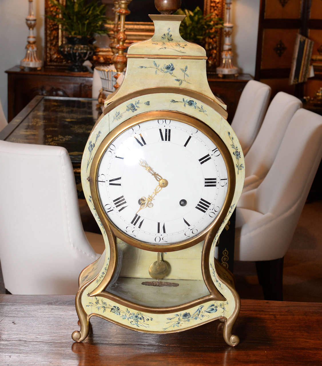 18th century Swiss cartel clock, circa 1790
Painted in the style of toile fabric this cartel clock has been designed in the classic style. The painted decoration on the clock is somewhat naive with small roses adorning the case. The stand, which