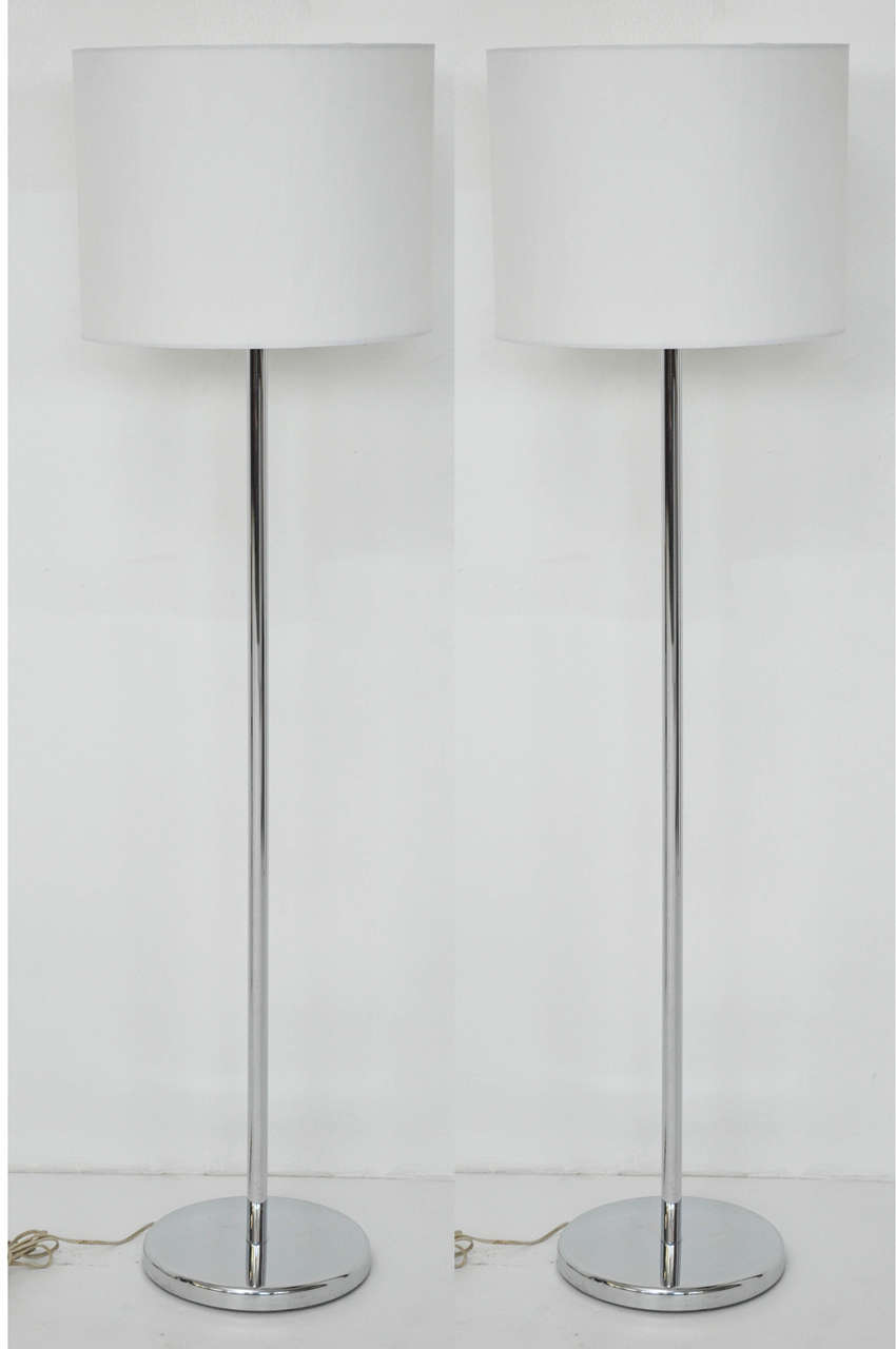 Pair of nickel finish floor lamps by Nessen Studios.