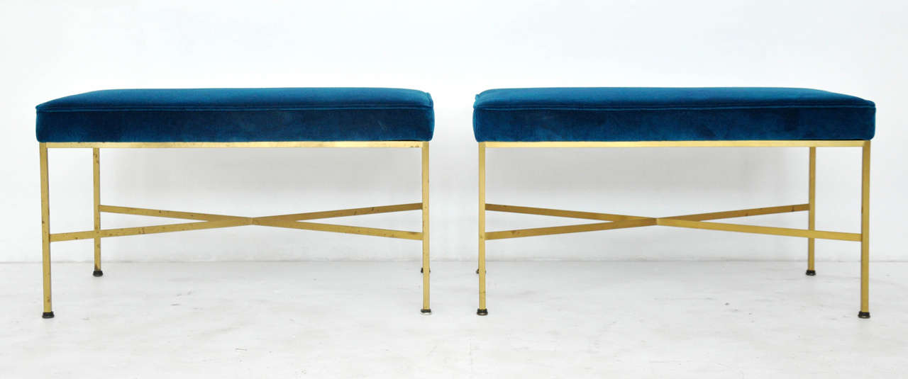 Pair of brass X-frames benches designed by Paul McCobb for Calvin Furniture. Newly upholstered in vibrant blue velvet over original brass finish bases, showing beautiful golden patina.