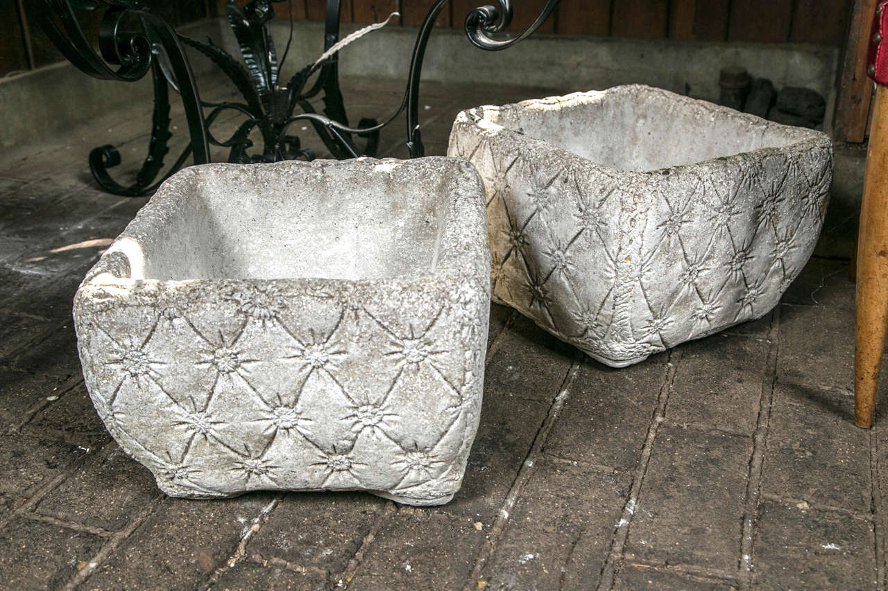 Charming pair of tufted style cement garden planters. Signed Pan Art.