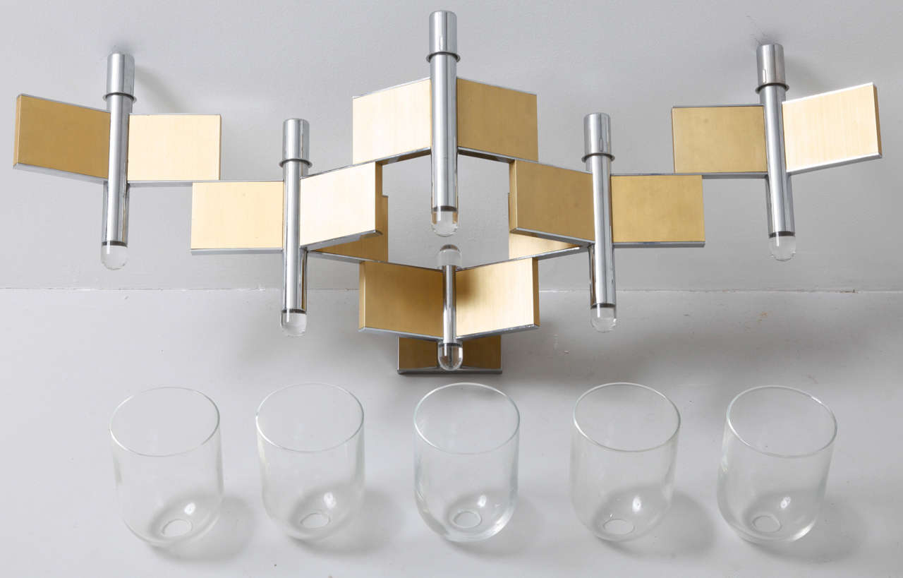 Large wallamp designed by Geatano Sciolari Italy 1970s.
brass,chrome and clear glass.
