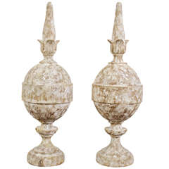 A pair of decorative finials