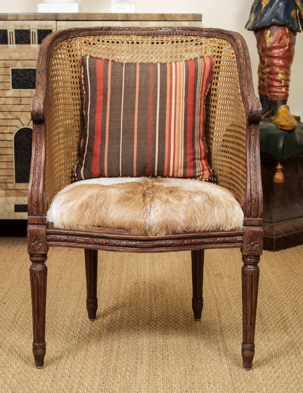 A Pair of Caned Back Chairs