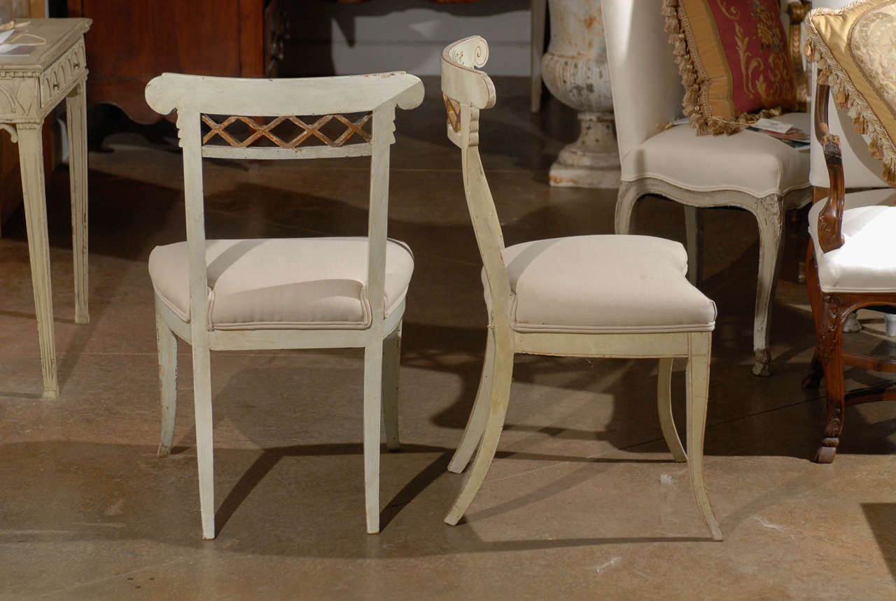 18th Century Set of Four Italian 1790s Neoclassical Period Music Chairs with Gilded Trellis For Sale
