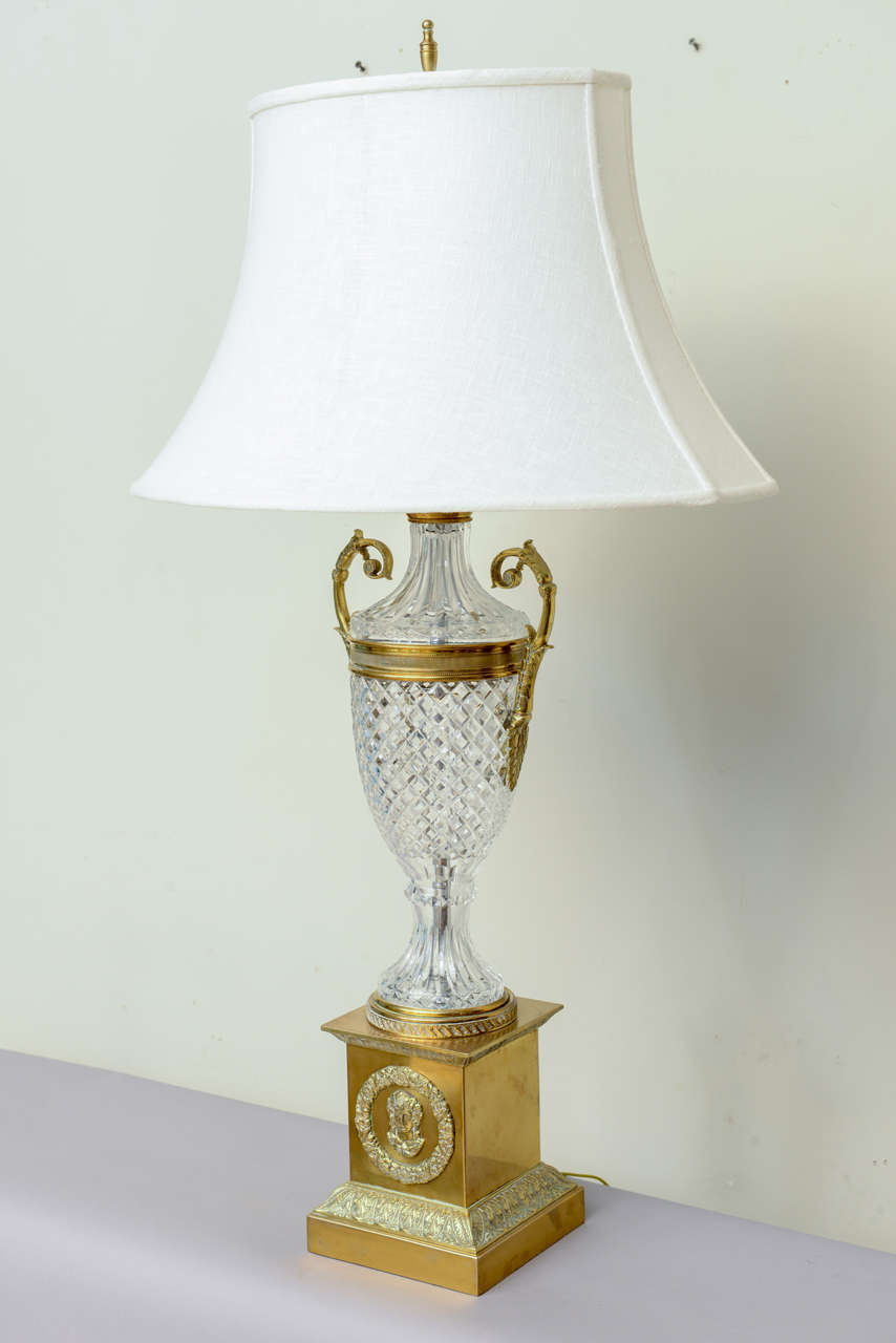 Pair of magnificent lamps, by Warren Kessler, urn shape, cut with diamond pattern, raised on bronze plinth. Shown with shades (not included).

Stock ID: D5487