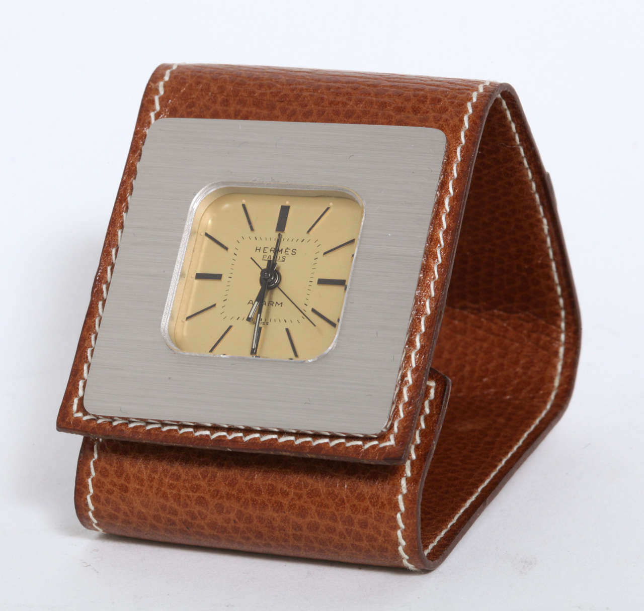 An elegant folding leather clock by Hermes