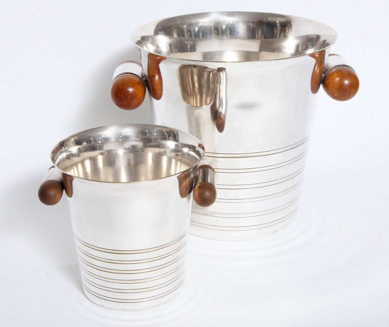 A great set of Ice buckets by Christofle in Gallia metal with wood handles marked on underside large one is 8