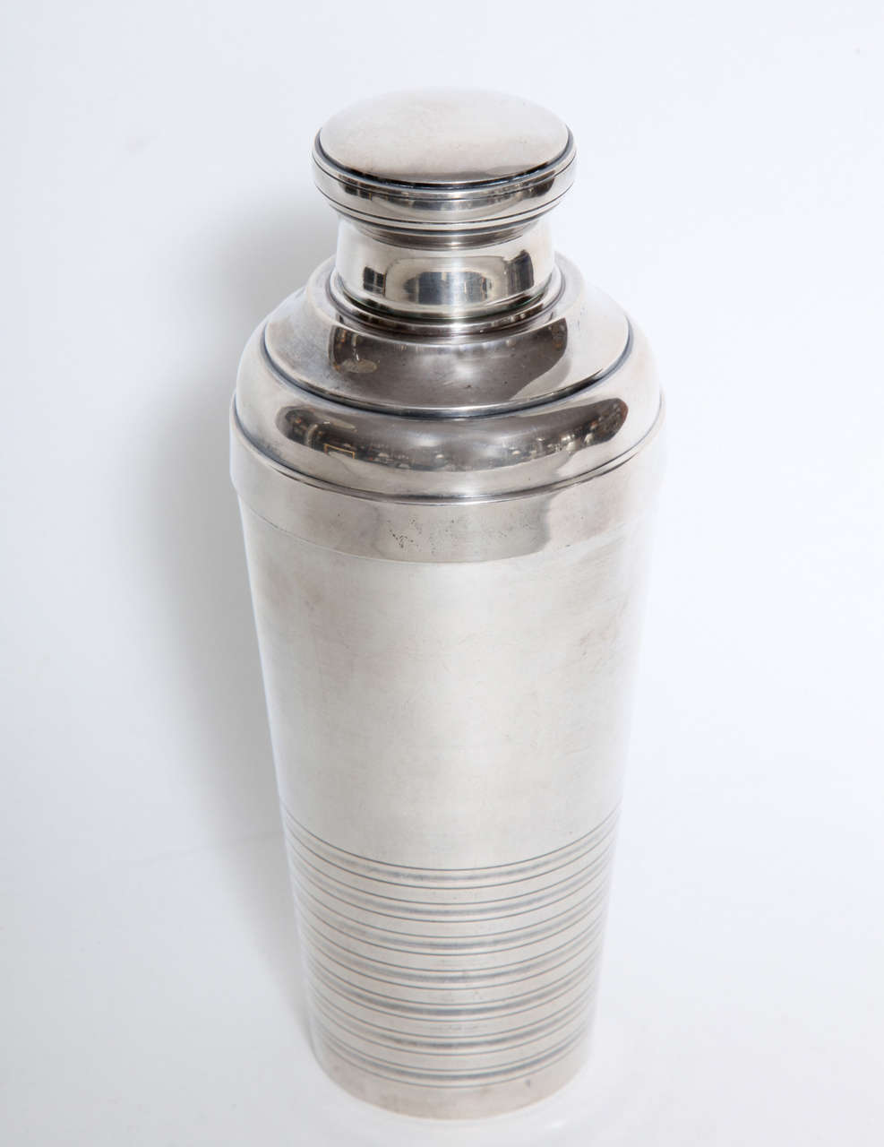 A stylish cocktail shaker for Christofle in gallia plated metal marked on the underside.