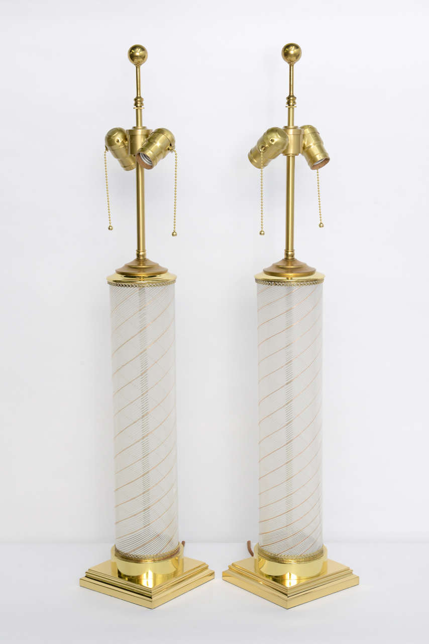 Fine Dino Martens for Aureliano Toso blown Murano Glass Columnar Table Lamps with polished brass mounts. Controlled mezza filigrana swirls of bronze, gold and white. Modern Empire inspired styling with new double cluster UL sockets and silk wrap