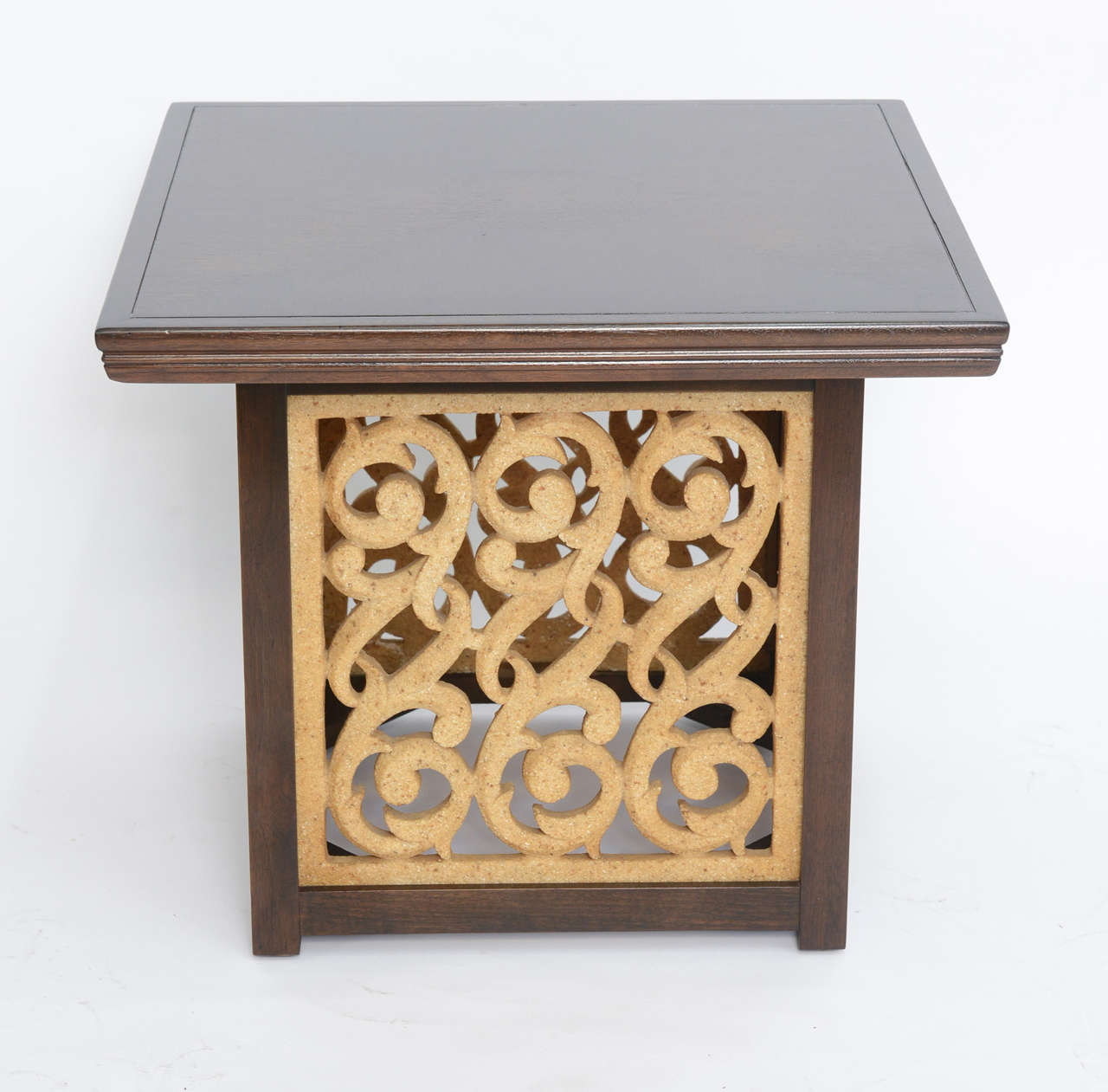 REDUCED FROM $2,250.
Rarely seen, this Widdicomb table features an elegant square molded and inlaid walnut top and legs in Sable color with cast sculptural resin panels in a repeating C-scroll design. inlay design is quartered with a circular
